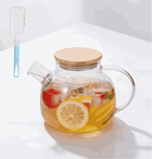 Tetera de vidrio con tapa de bambu